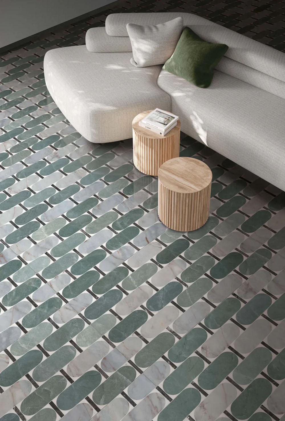 Living area featuring Lucca Abacus 3D Décor 60 × 120cm porcelain floor tiles, showcasing an elongated geometric pattern in soft green and marble-effect tones, paired with contemporary furniture and warm wood accents.