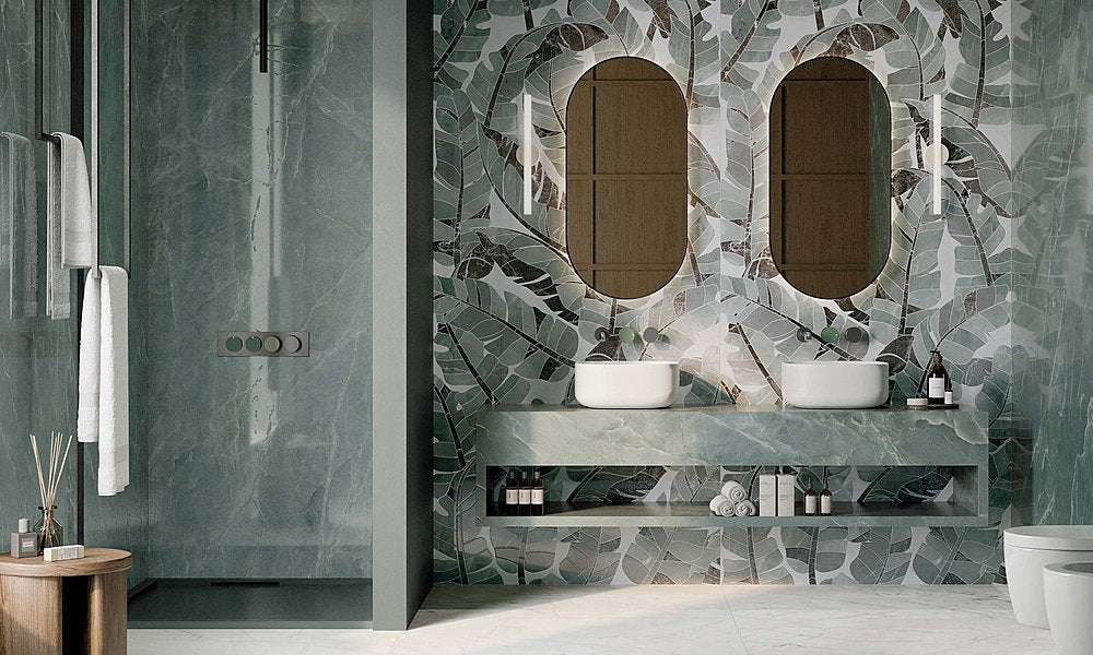 Luxury bathroom featuring Lucca Bali 3D Décor 60 × 120cm porcelain wall tiles, showcasing layered tropical leaf patterns in soft green tones, paired with marble-effect surfaces and contemporary spa-inspired interiors.