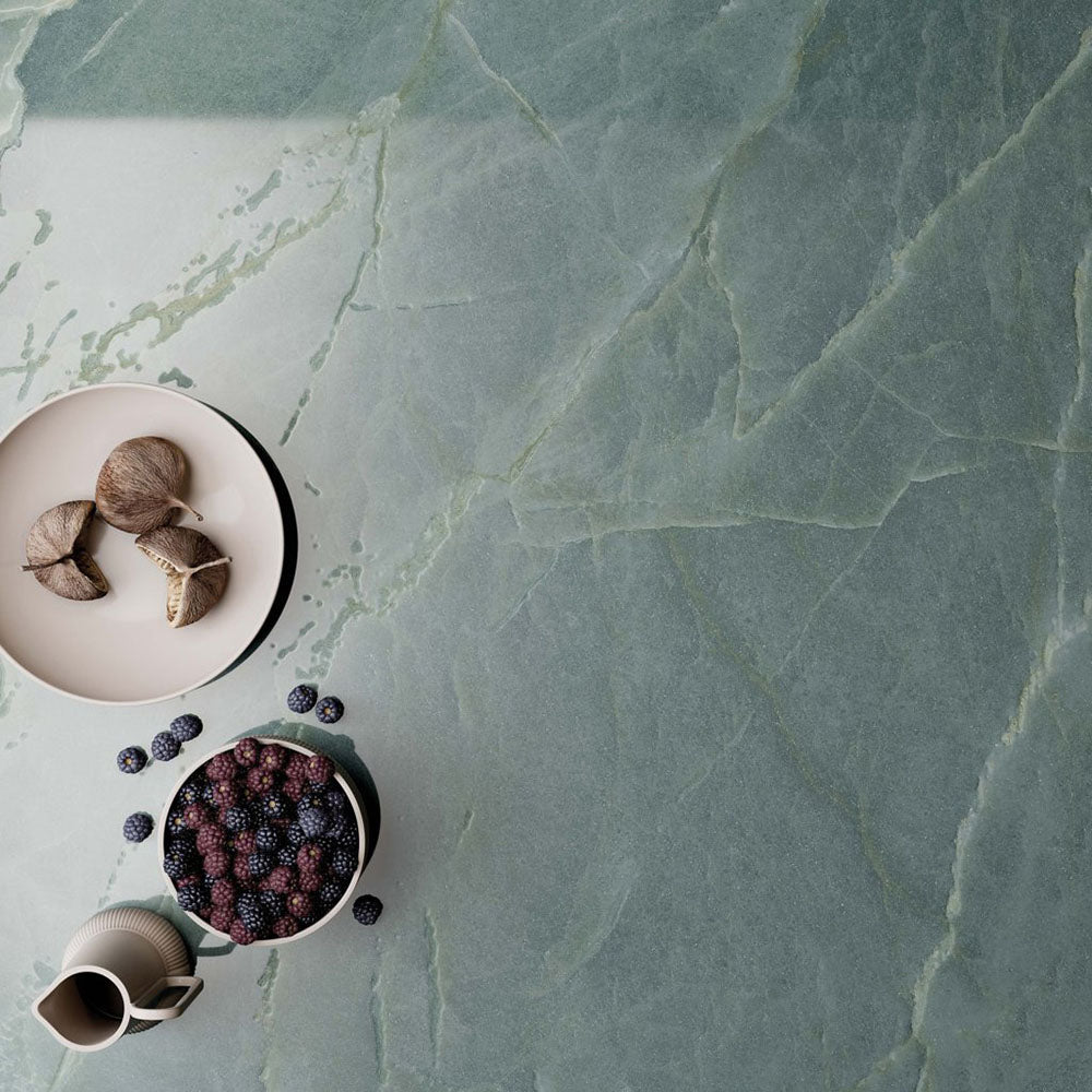 Close-up of Lucca Ocean Green Lux 3D 60 × 120cm porcelain wall and floor tile, showcasing rich green marble-effect tones with subtle veining and a luxurious polished stone-inspired finish.