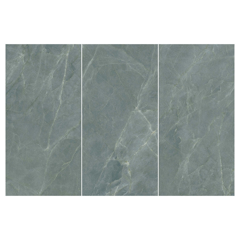 Flat lay of Lucca Ocean Green Lux 3D 60 × 120cm porcelain wall and floor tiles, featuring rich green marble-effect tones with subtle natural veining and a luxurious polished stone-inspired finish.