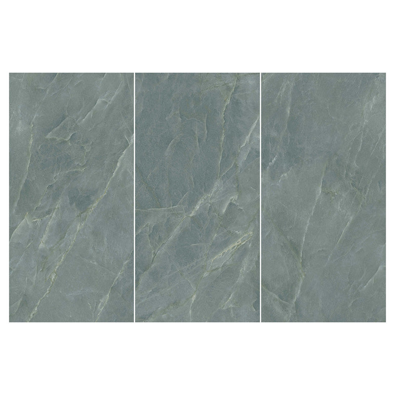 Flat lay of Lucca Ocean Green Natural Matt 60 × 120cm porcelain wall and floor tiles, featuring soft green marble-effect tones with subtle natural veining and a refined stone-inspired matt finish.