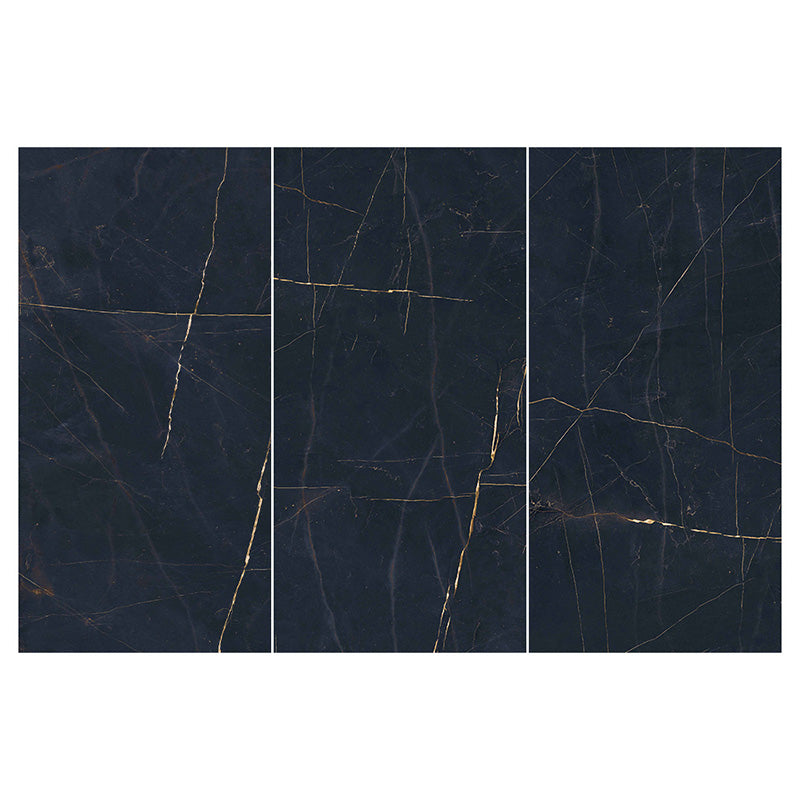 Flat lay of Lucca Precious Noir Lux 3D 60 × 120cm porcelain wall and floor tiles, showcasing a deep black marble-effect surface with fine gold veining and a polished luxury-inspired finish.