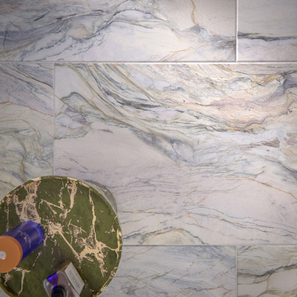 Close-up of Lucca Quartz Matt 60 × 120cm porcelain wall and floor tiles, showcasing flowing marble-effect veining in soft grey, cream, and blue tones with a refined natural stone-inspired finish.