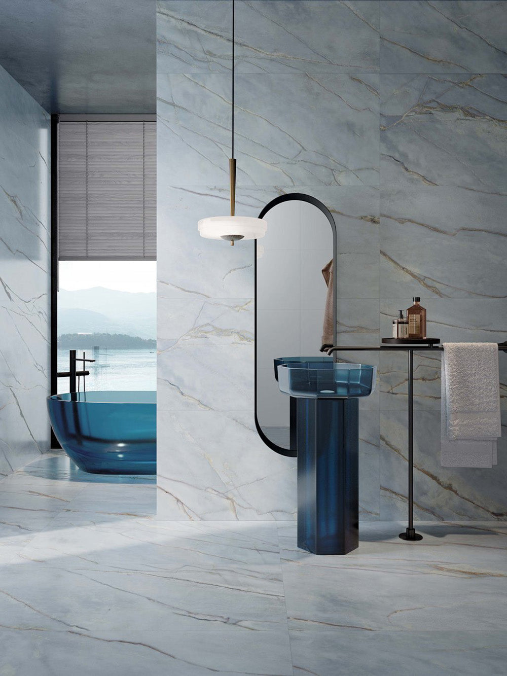 Luxury bathroom featuring Lucca River Blue Lux 3D 60 × 120cm porcelain wall and floor tiles, styled with soft blue marble-effect veining, black fittings, sculptural blue basins, and contemporary spa-inspired interiors.
