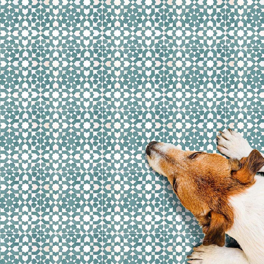 Floor featuring Berber Tetuan Green 15×15cm Moroccan-style porcelain tiles, showcasing a soft green geometric pattern.