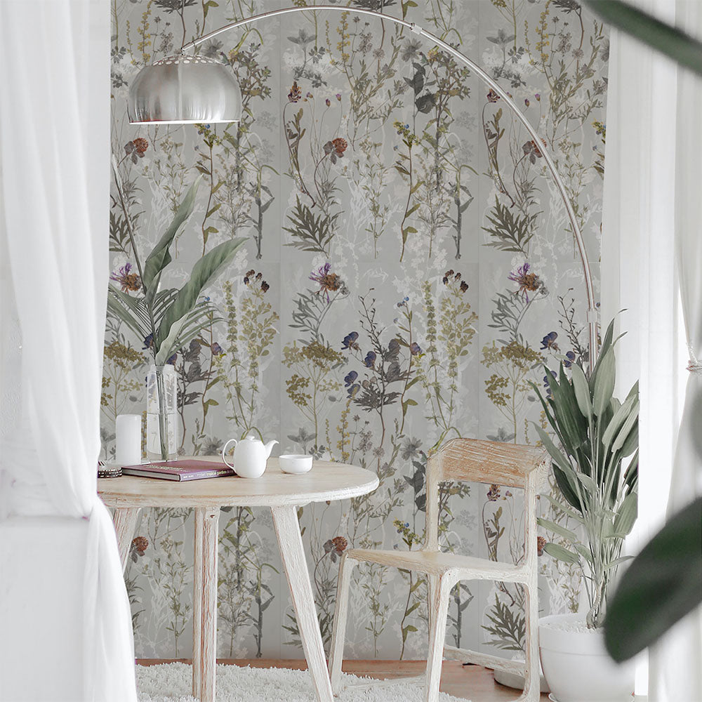 Interior corner featuring Meadow Flowers Decor 60 × 120cm porcelain wall tiles, styled with a small dining table, wooden chair, indoor plants, and soft natural light for a calm, nature-inspired setting.