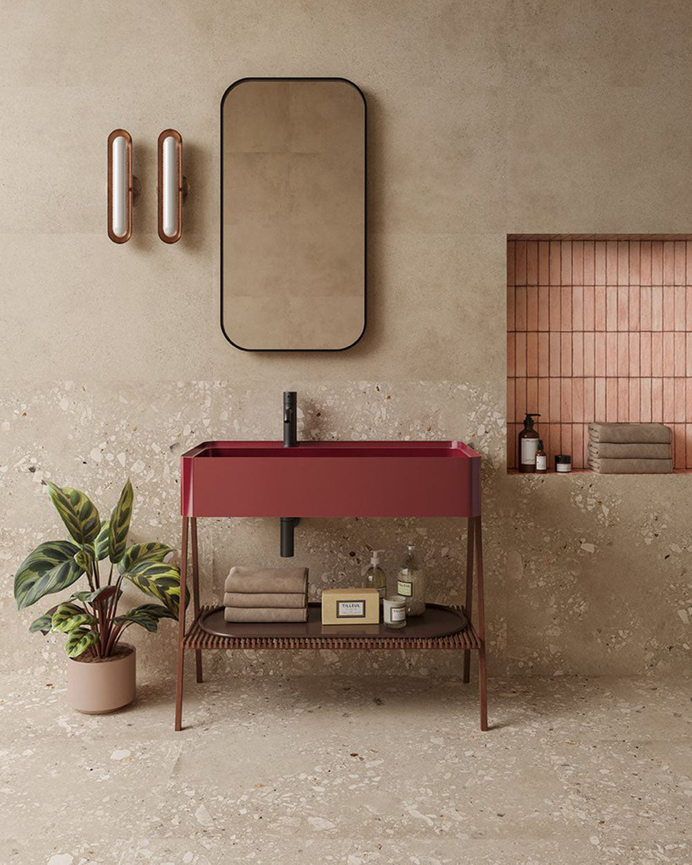 Contemporary bathroom featuring Melange Sand concrete-effect wall and floor tiles 60 × 60cm, showcasing warm sand-toned concrete-inspired detailing with subtle texture, paired with terrazzo accents, blush pink features, and minimalist décor.