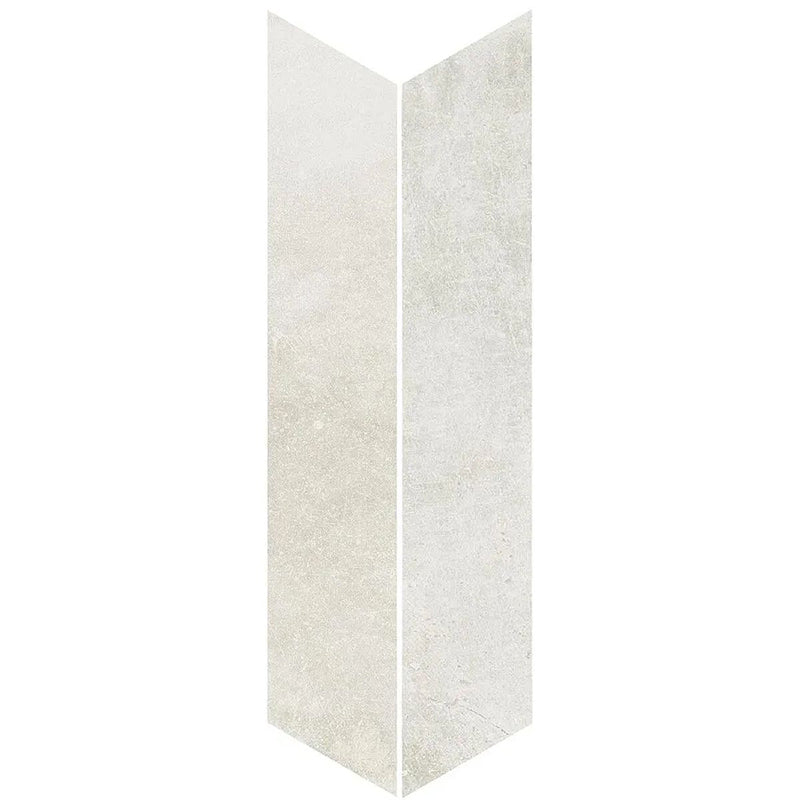 Product display of Monzo Stone Chevron Silk 10x53cm stone-effect porcelain chevron tiles in soft ivory tones, featuring subtle texture and tonal variation with a natural stone-inspired finish.