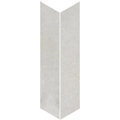 Product display of Monzo Stone Chevron Silver 10x53cm stone-effect porcelain chevron tiles in soft silver-grey tones, featuring subtle texture and natural tonal variation with a contemporary stone-inspired finish.