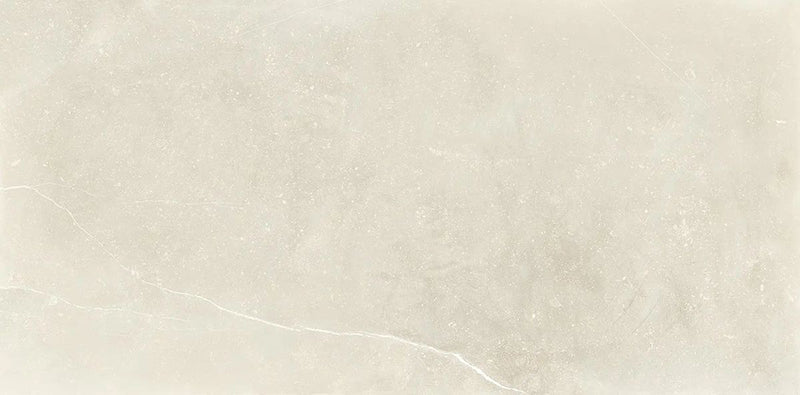 Product display of Monzo Stone Sand 30x60cm stone-effect porcelain tiles in soft warm beige tones, featuring subtle texture, delicate veining, and a contemporary natural stone-inspired finish.
