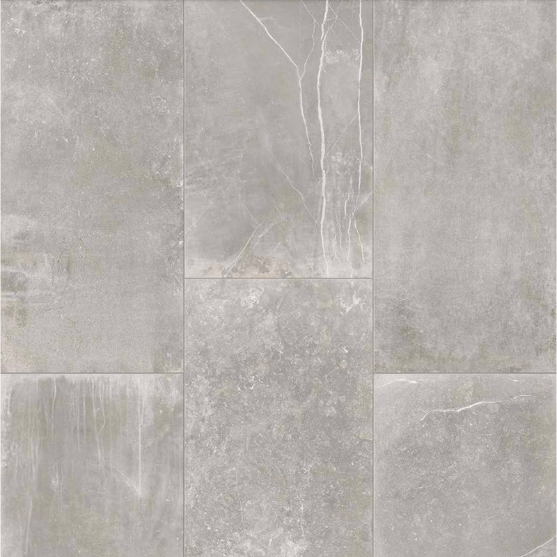 Product display of Monzo Stone Titanium 30x60cm stone-effect porcelain tiles in soft grey tones, featuring subtle texture, layered veining, and tonal variation with a natural stone-inspired finish.