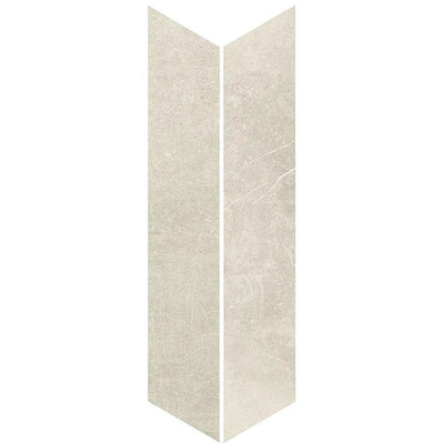 Product display of Monzo Stone Chevron Sand 10x53cm chevron porcelain tiles in soft warm beige tones, featuring subtle stone-effect texture, delicate veining and a contemporary geometric chevron shape inspired by natural stone surfaces.