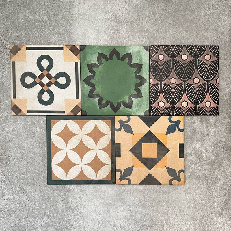 Cuba Patchwork Moroccan-style porcelain tiles in a 20×20cm square format, arranged in a mixed patchwork layout featuring a variety of geometric, floral and traditional motifs in earthy, green, blue and terracotta tones, highlighting the tile’s eclectic, encaustic-style design and rich visual texture.