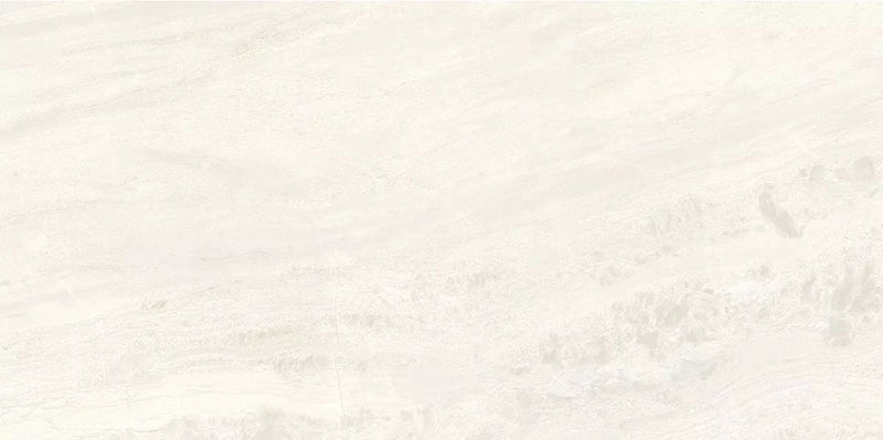 Close-up of Petra Avorio Ivory stone marble effect porcelain wall and floor tiles in a 60cm x 120cm format, showcasing soft ivory, cream and light beige veining with subtle natural stone-inspired movement, creating a bright and elegant surface for bathrooms, kitchens, living spaces and commercial interiors.