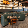 Restaurant interior featuring Abbey Black & White A 28×28cm Victorian-style patterned porcelain mosaic floor tiles.