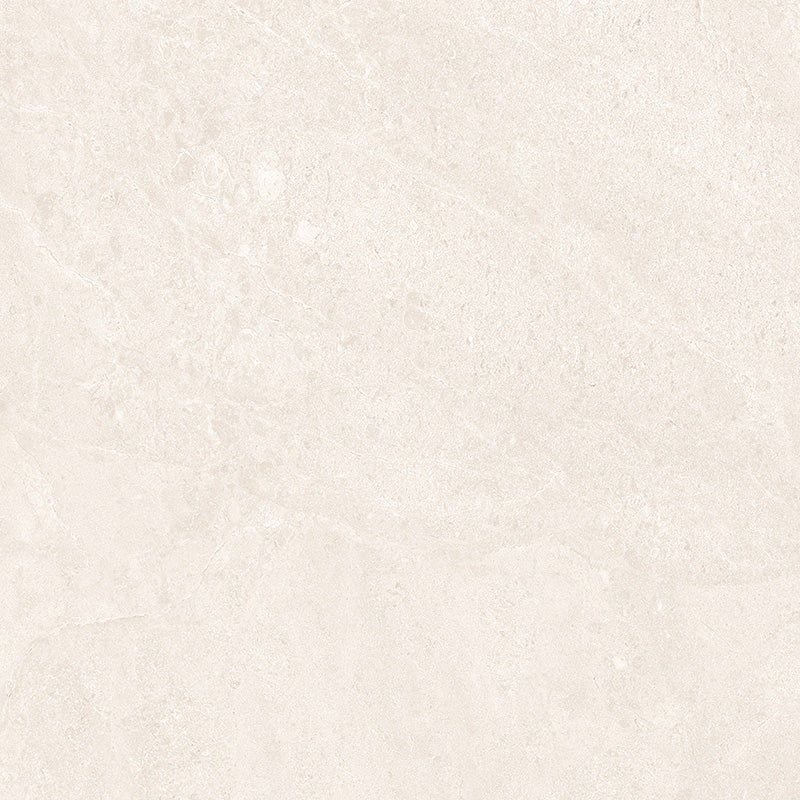 Close-up of Riad Blanco Neutra Stone 60x60cm stone-effect wall and floor tile, featuring soft cream and ivory tones with delicate natural stone-inspired veining and a subtle, elegant textured finish.