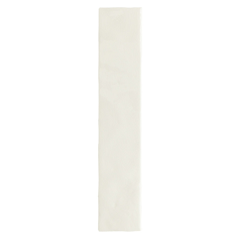 Bora Bora White Sand Brick ceramic wall tile in a 6.5 × 32.8cm slim brick format, featuring a soft white sand tone and a flux glaze finish with subtle surface variation, shown as a single tile on a white background.