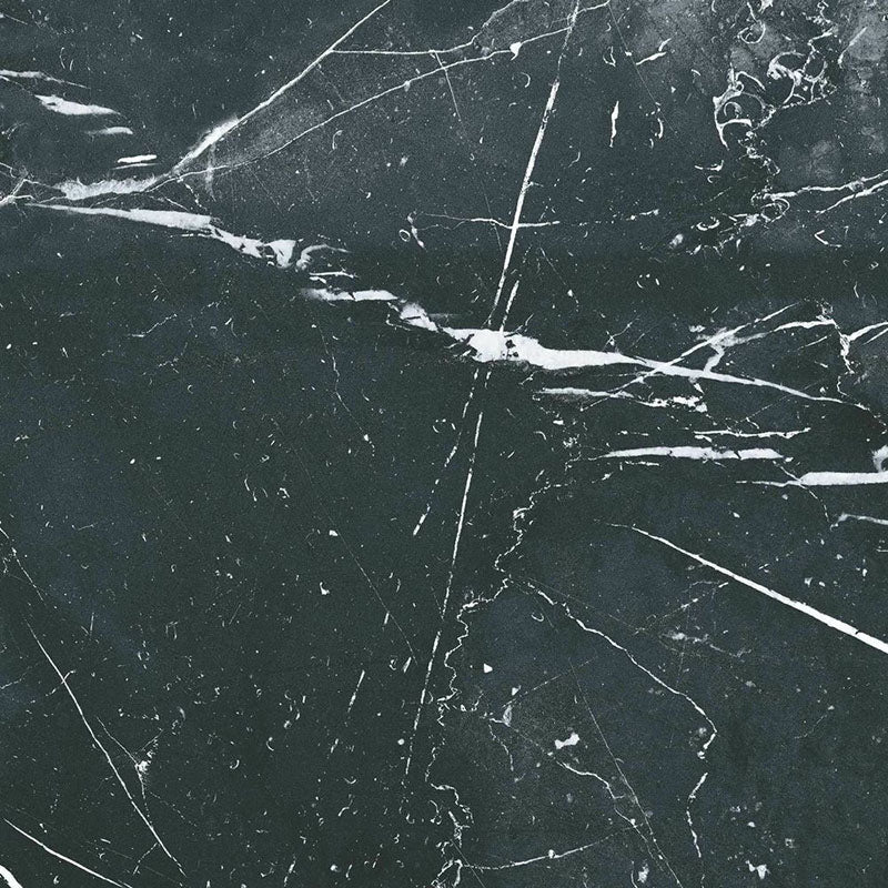 Close-up of Florence Grand Marquina Black 50x50cm marble-effect porcelain tile, showcasing a deep black base with bold white veining and a realistic, high-impact marble-look finish.