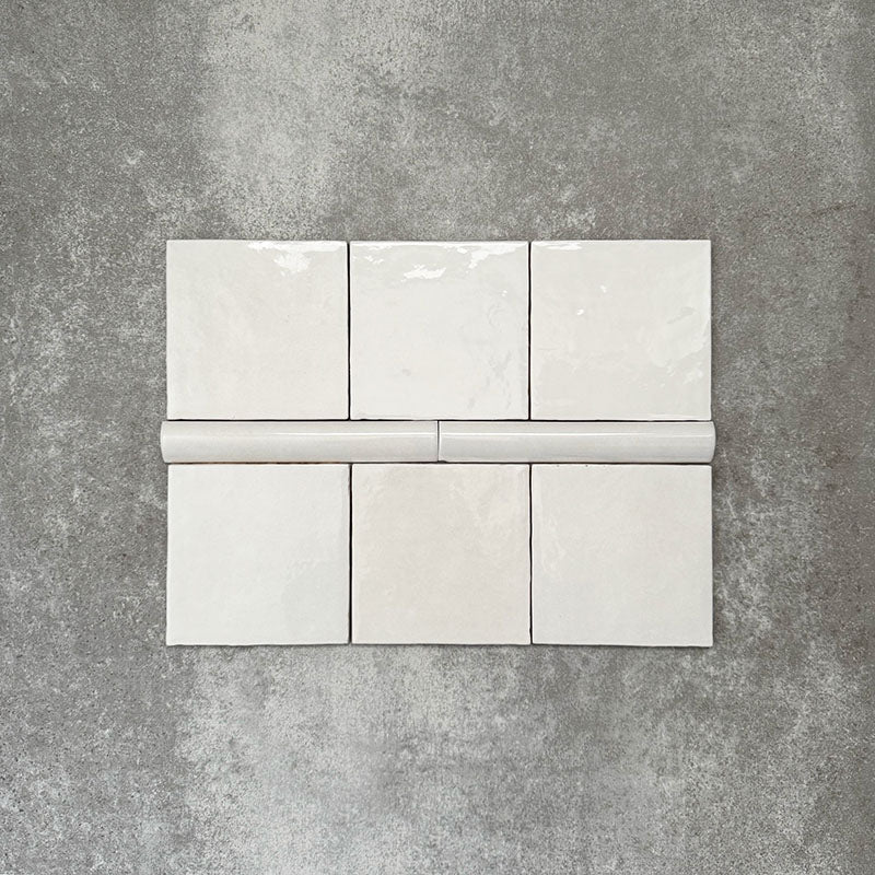 Zellige White Moroccan-style ceramic square tiles with matching 3 × 20cm bullnose trim, shown in a clean, glossy white finish.