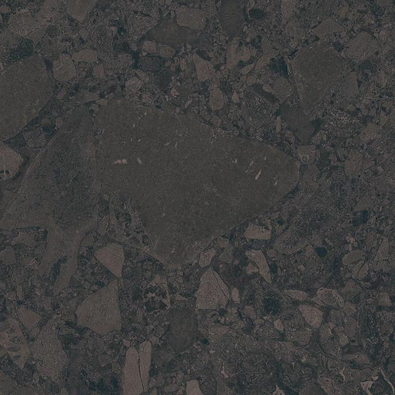Close-up of Terrazerri Terrazzo Black 60x60cm porcelain tile featuring a deep charcoal terrazzo effect. The design combines large and small dark stone fragments with subtle tonal variation, creating a dramatic, contemporary surface for modern walls and floors.