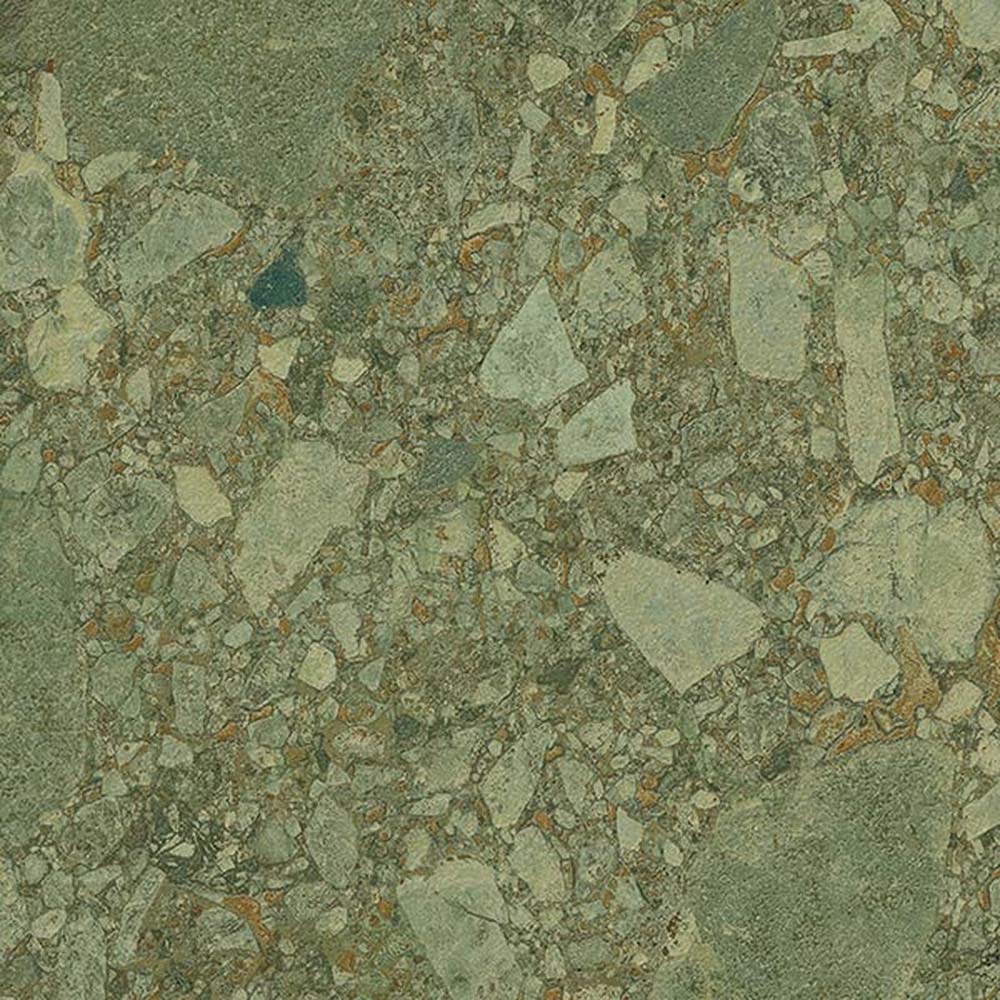 Close-up of Terrazerri Terrazzo Green 60x60cm porcelain tile featuring a terrazzo effect in soft sage green tones. The design combines large and small stone fragments with subtle warm brown flecks, creating a natural, contemporary surface with depth and texture for walls and floors.