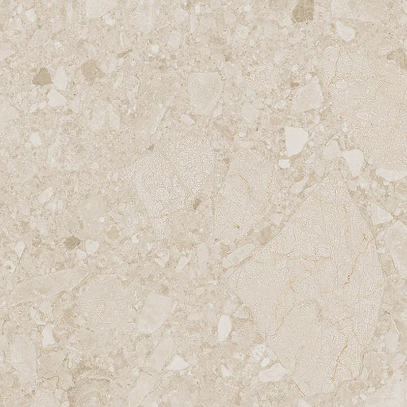 Close-up of Terrazerri Terrazzo Ivory 60x60cm porcelain tile featuring a soft ivory terrazzo effect. The design blends cream and beige stone fragments with delicate tonal variation, creating a warm, understated surface ideal for modern walls and floors.