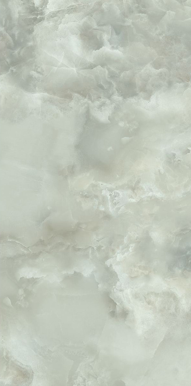 Close-up of Thebes Green Honed Matt Onyx 60x120cm porcelain tile featuring soft green onyx-effect veining with cloudy white and pale sage tones. The honed matt finish creates a natural stone look, ideal for bathroom walls, feature walls and luxurious interior spaces.