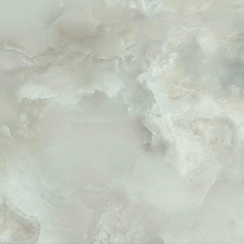 Close-up of Thebes Green Honed Matt Onyx 60x60cm porcelain tile featuring soft green onyx-effect veining with cloudy white and pale sage tones. The honed matt finish creates a natural stone look, ideal for bathroom walls, feature walls and luxurious interior spaces.