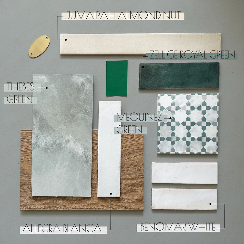 Flat lay moodboard featuring Thebes Green Honed Matt Onyx porcelain tile paired with complementary green and neutral wall tiles, including Zellige Royal Green, Jumairah Almond Nut, Allegra Blanca, Benomar White and Mequinez Green. Wood effect samples, brass accents and paint swatches complete the contemporary bathroom design palette.