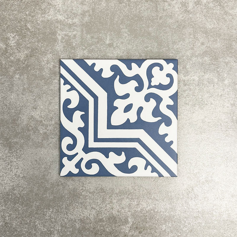 Single London Streets Thornton Place 20x20cm Victorian Moroccan style porcelain tile featuring an ornate corner pattern in soft blue and white tones, designed to create a repeating decorative floor layout inspired by traditional Victorian-style patterned tiles.