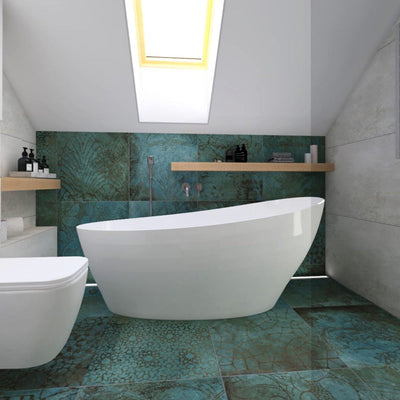 Contemporary bathroom featuring Verde Patterns Copper Oxide 60cm x 60cm metallic effect porcelain wall and floor tiles, paired with a freestanding bath, concrete effect walls, floating timber shelf and skylight.