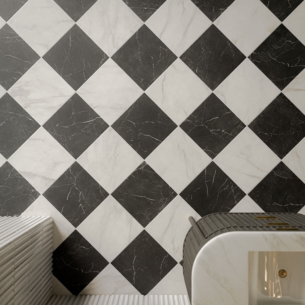 Vitoria Classic Bianco White 30cm x 30cm marble effect tiles, arranged in a classic black and white chequerboard pattern with delicate veining for an elegant, timeless floor.
