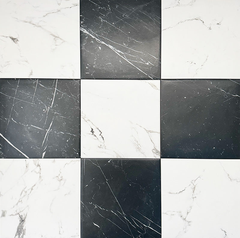 Patterned layout featuring Florence Calacatta White 25x25cm marble-effect porcelain tiles paired with contrasting black marble-look tiles, showcasing the soft grey veining and classic black and white checkerboard design.