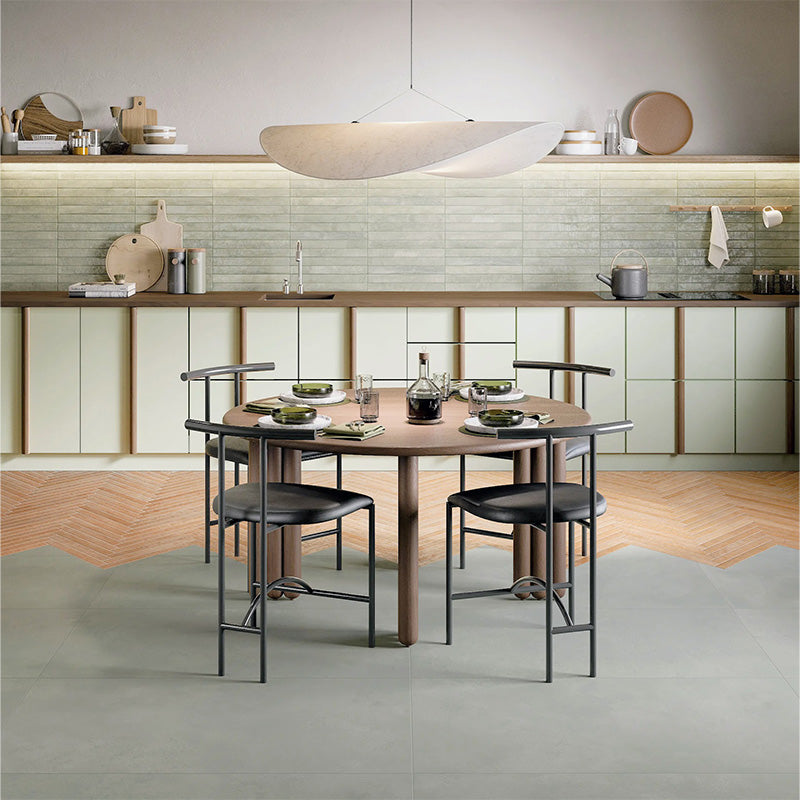 Jumairah Clay and Green 5x40 tiles with green wall tiles and clay floor tiles in a modern kitchen interior