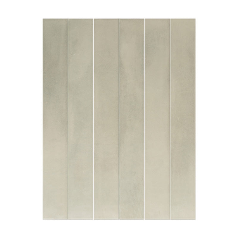 Jumairah Green 5x40 ceramic wall tiles showing soft green colour variation and subtle surface texture